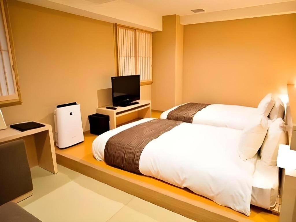 Spa Land Hotel Naito Fuefuki Exterior foto